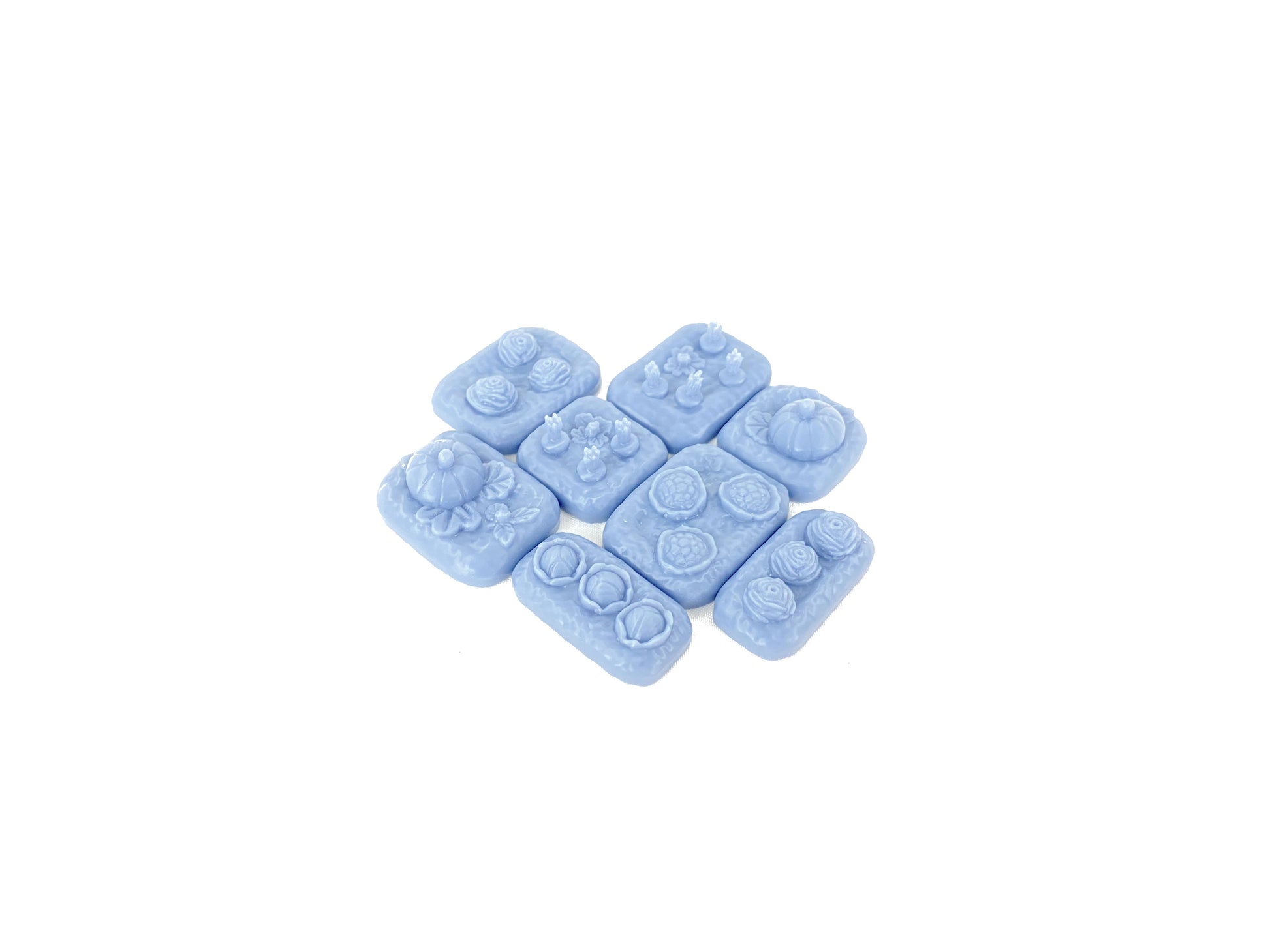 Acht unbemalte modulare Gemüsefeld-Scatter-Bases aus Resin, mit detaillierten Gemüseformen wie Kürbis, Salat, Blumenkohl und Rüben.